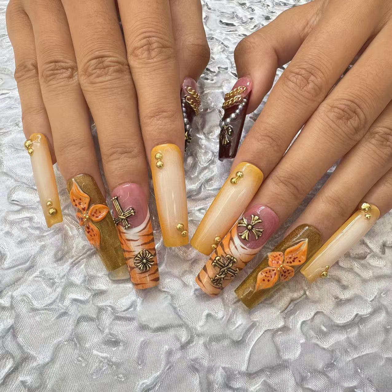 Exquisite Handmade Nail Art: Colorful Fusion with Cross, Flower & Chain Embellishments