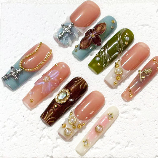 Exquisite Handmade Multicolored Nail Art with Floral and Gemstone Embellishments