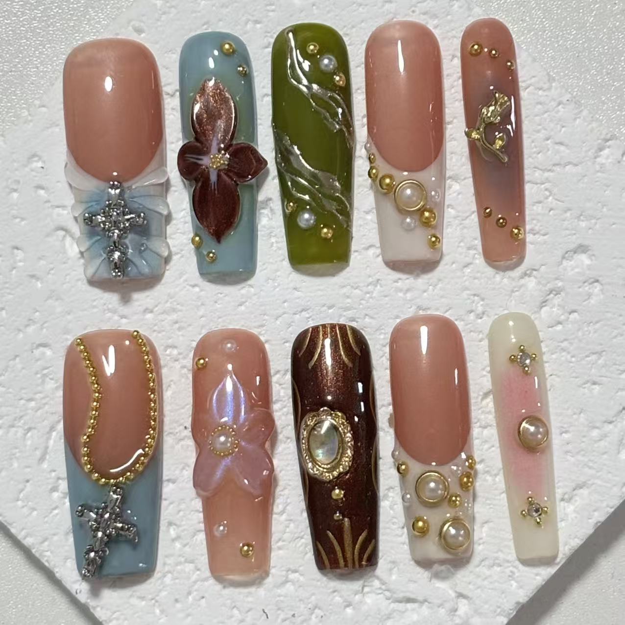 Exquisite Handmade Multicolored Nail Art with Floral and Gemstone Embellishments
