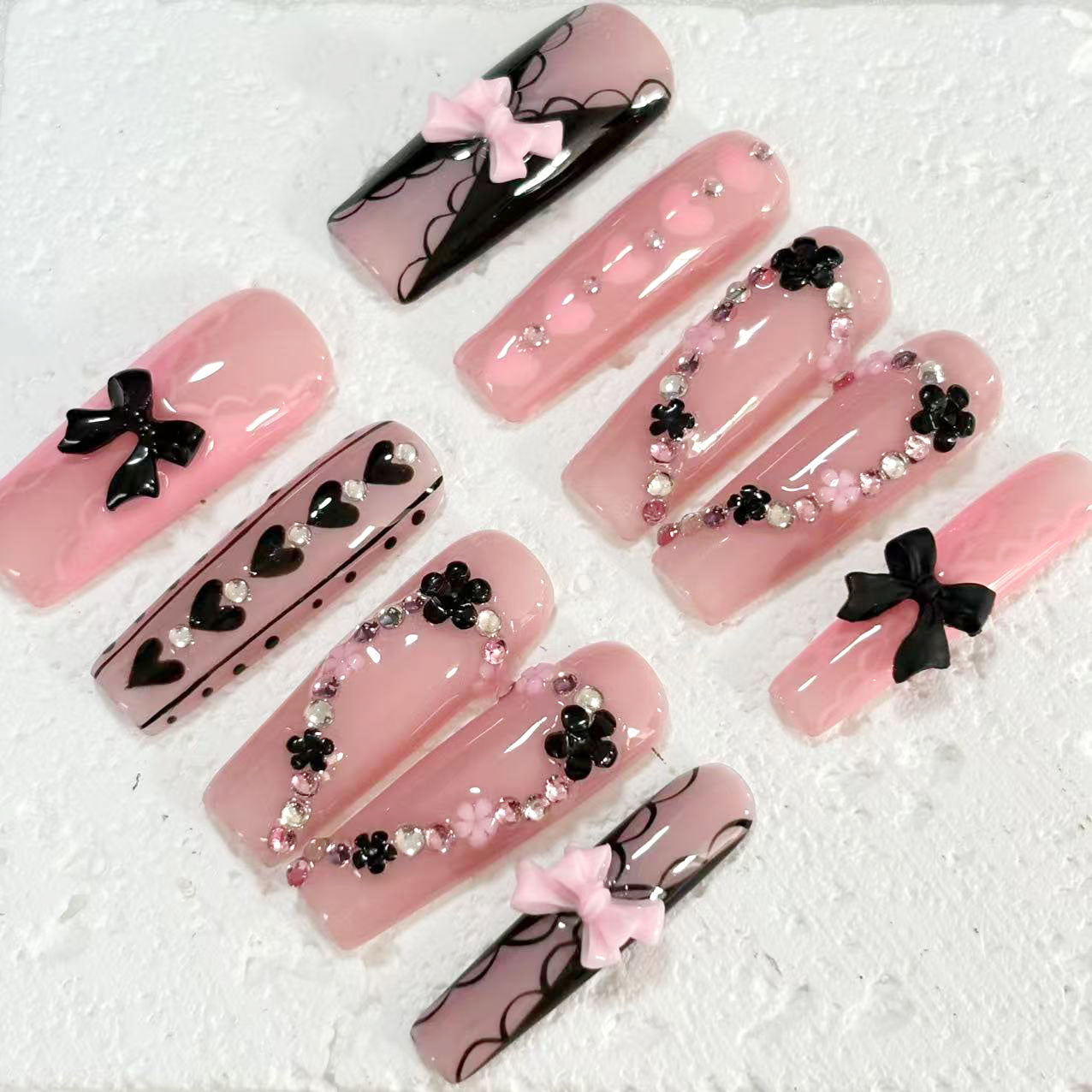 Romantic Handmade Pink Nail Art with Bow, Heart & Floral Embellishments