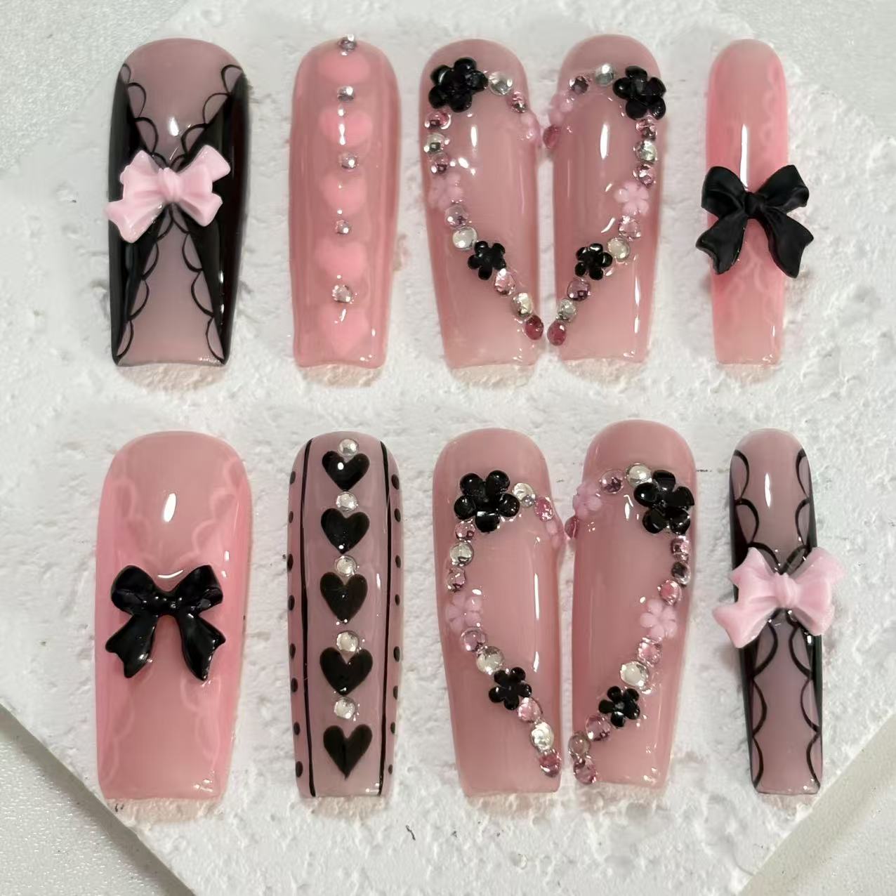 Romantic Handmade Pink Nail Art with Bow, Heart & Floral Embellishments